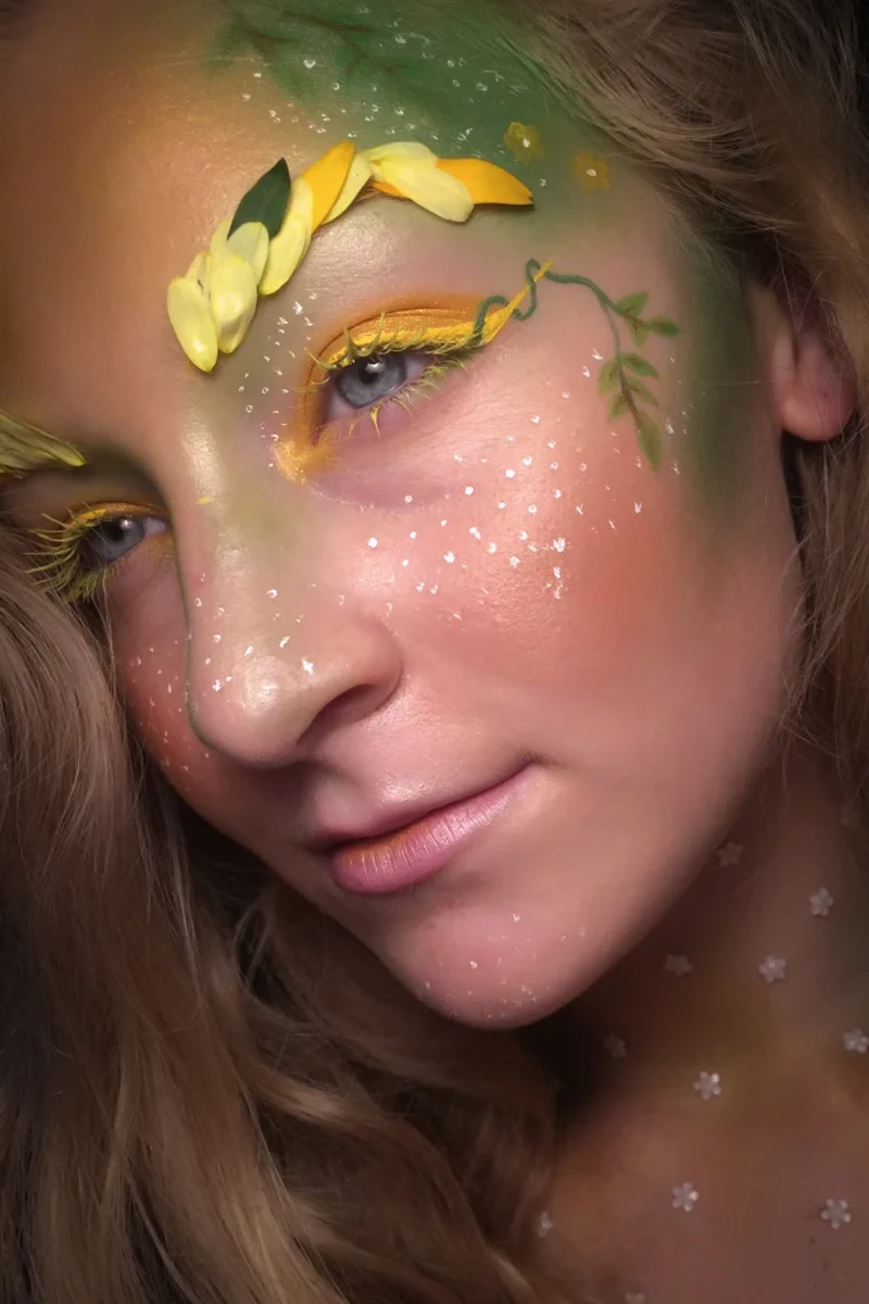 selfie of a beautful woman with a woodland fairy makeup look
