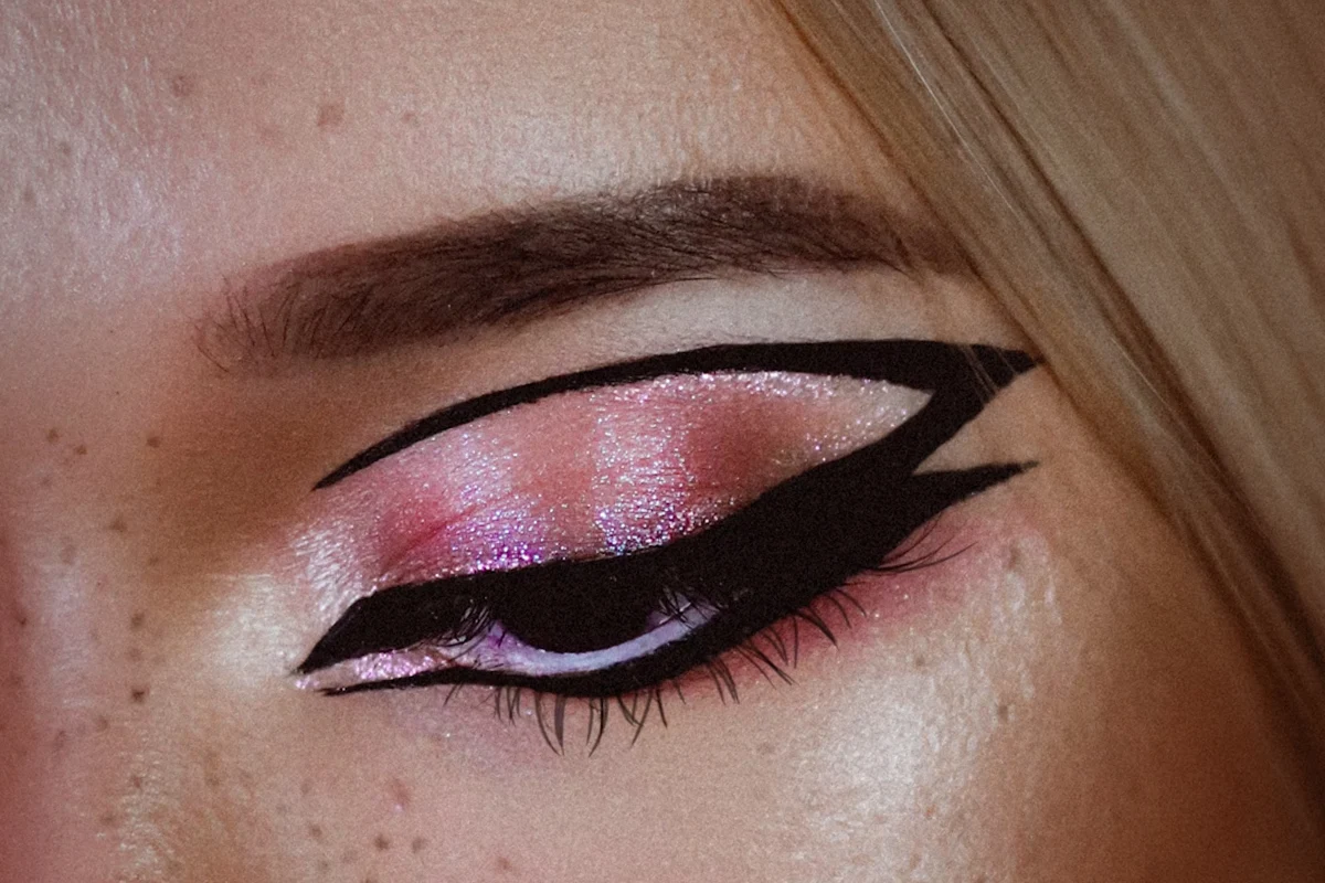 close-up of woman's eye with a graphic eyeliner look
